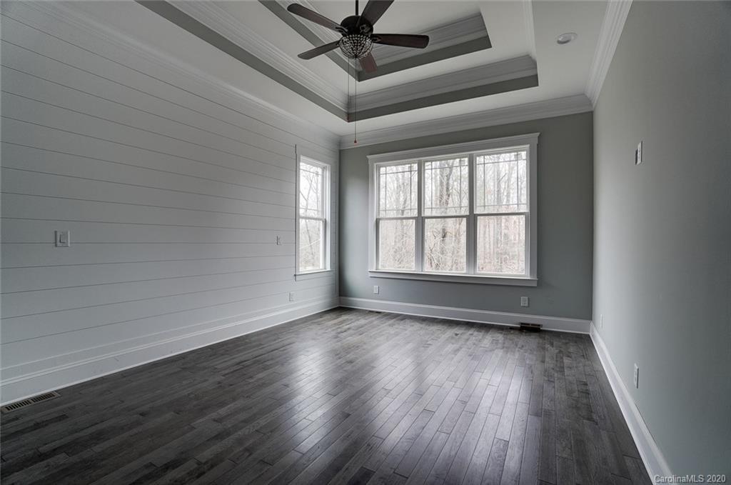 684 Portpatrick Place Fort Mill, SC 29708 - Photo 18 of 25 wooden floor in an empty room