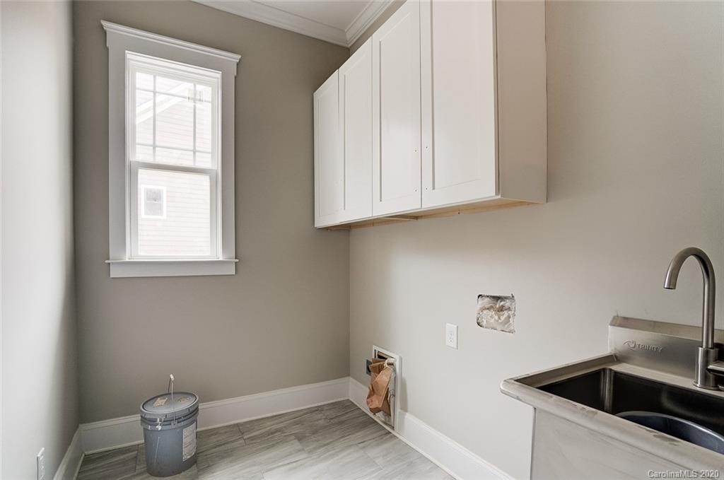 684 Portpatrick Place Fort Mill, SC 29708 - Photo 25 of 25 a bathroom with a sink and a window