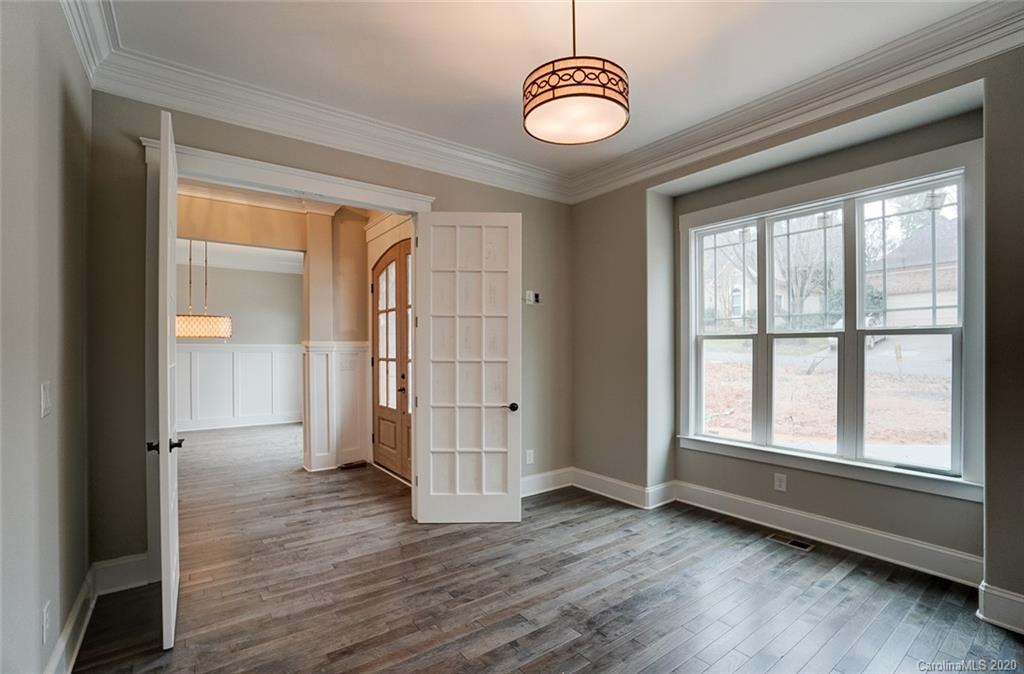 684 Portpatrick Place Fort Mill, SC 29708 - Photo 6 of 25 a view of empty room with wooden floor and fan