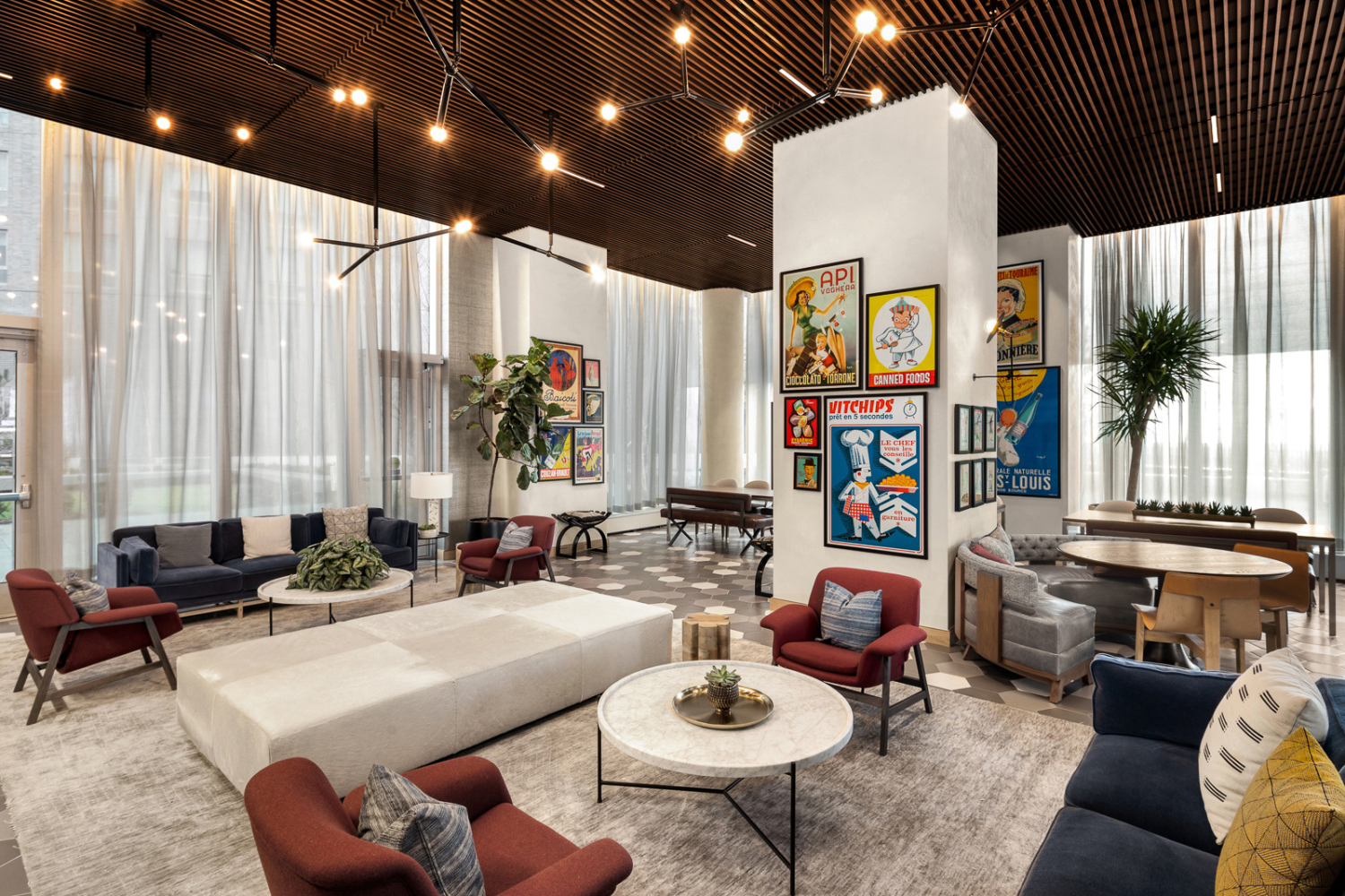 252 South Street, Unit 12N Manhattan, NY 10002 - Photo 13 of 15 a living room with furniture and large windows