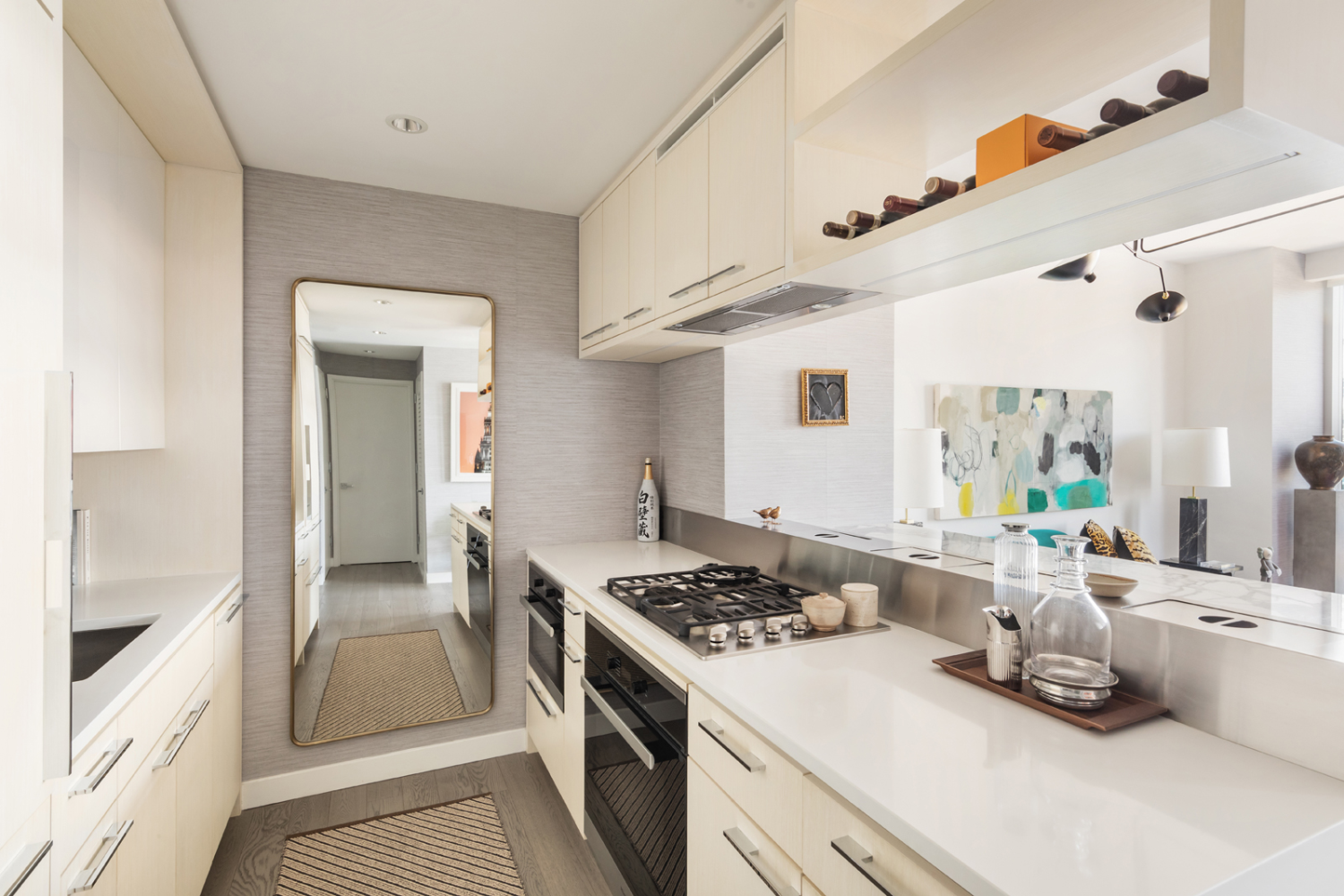 252 South Street, Unit 12N Manhattan, NY 10002 - Photo 2 of 15 a kitchen with a sink stove and refrigerator