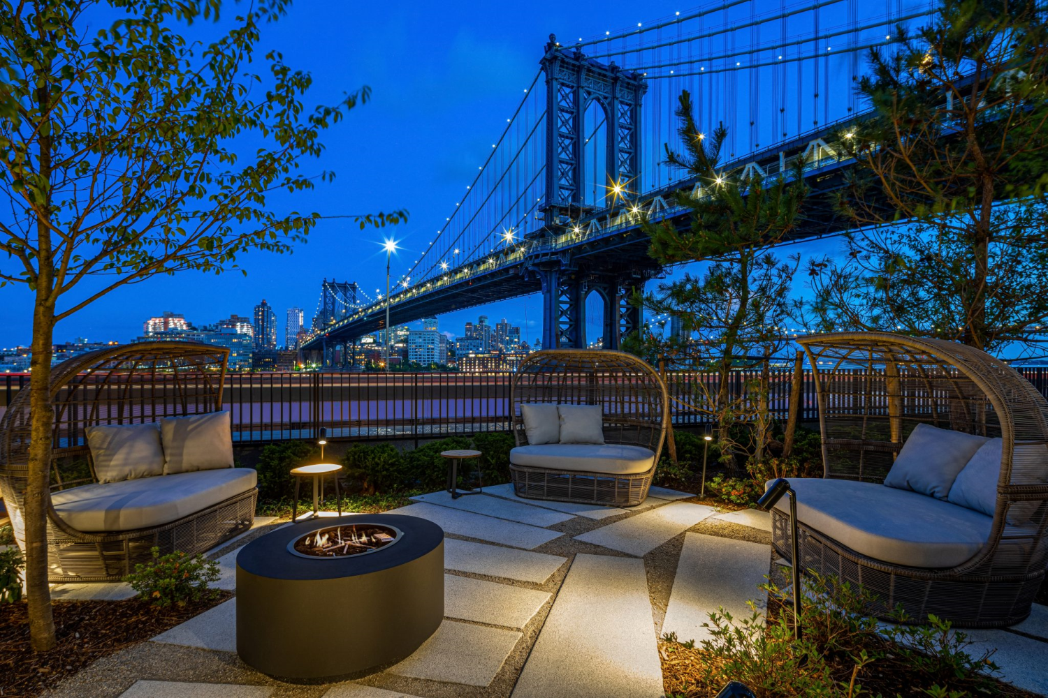 252 South Street, Unit 12N Manhattan, NY 10002 - Photo 7 of 15 a view of a patio with couches chairs and potted plants