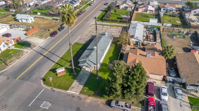 a view of a swimming pool with sitting area