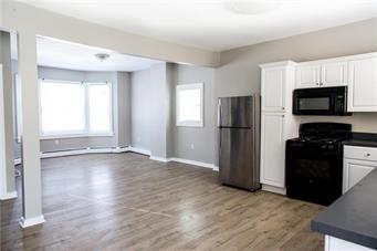 344 Bushkill Street, Unit 2 Easton, PA 18042 - Photo 30 of 30 An open floorplan seamlessly connects the kitchen to a naturally illuminated living space, ideal for entertaining.