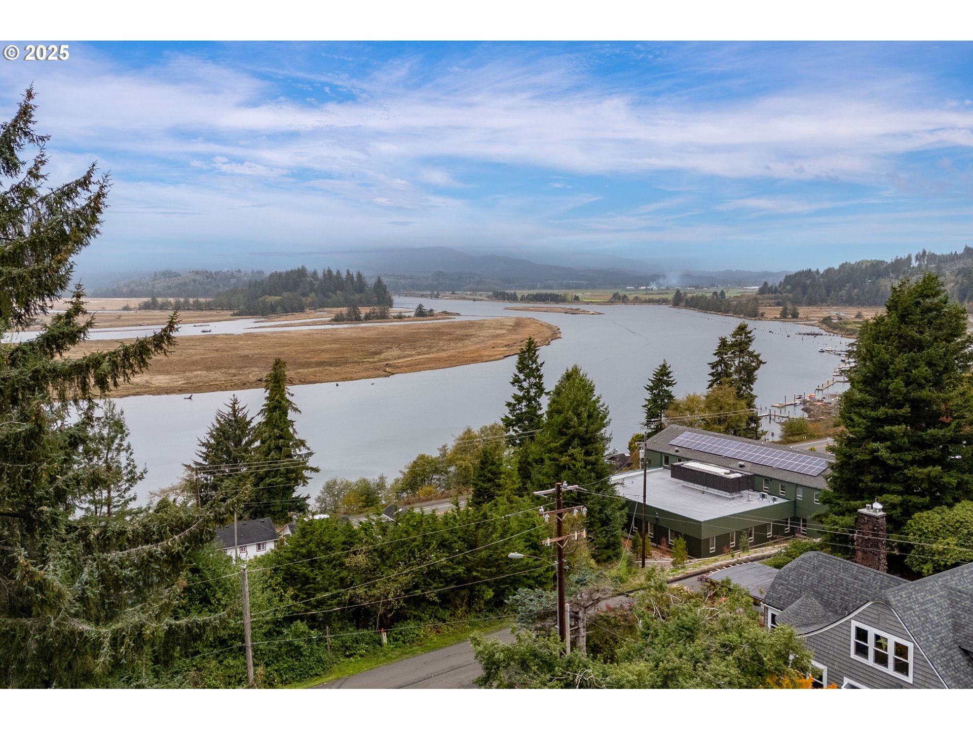 Rowe Street, Unit 1900 Wheeler, OR 97147 - Photo 3 of 11 a view of a lake with outdoor space