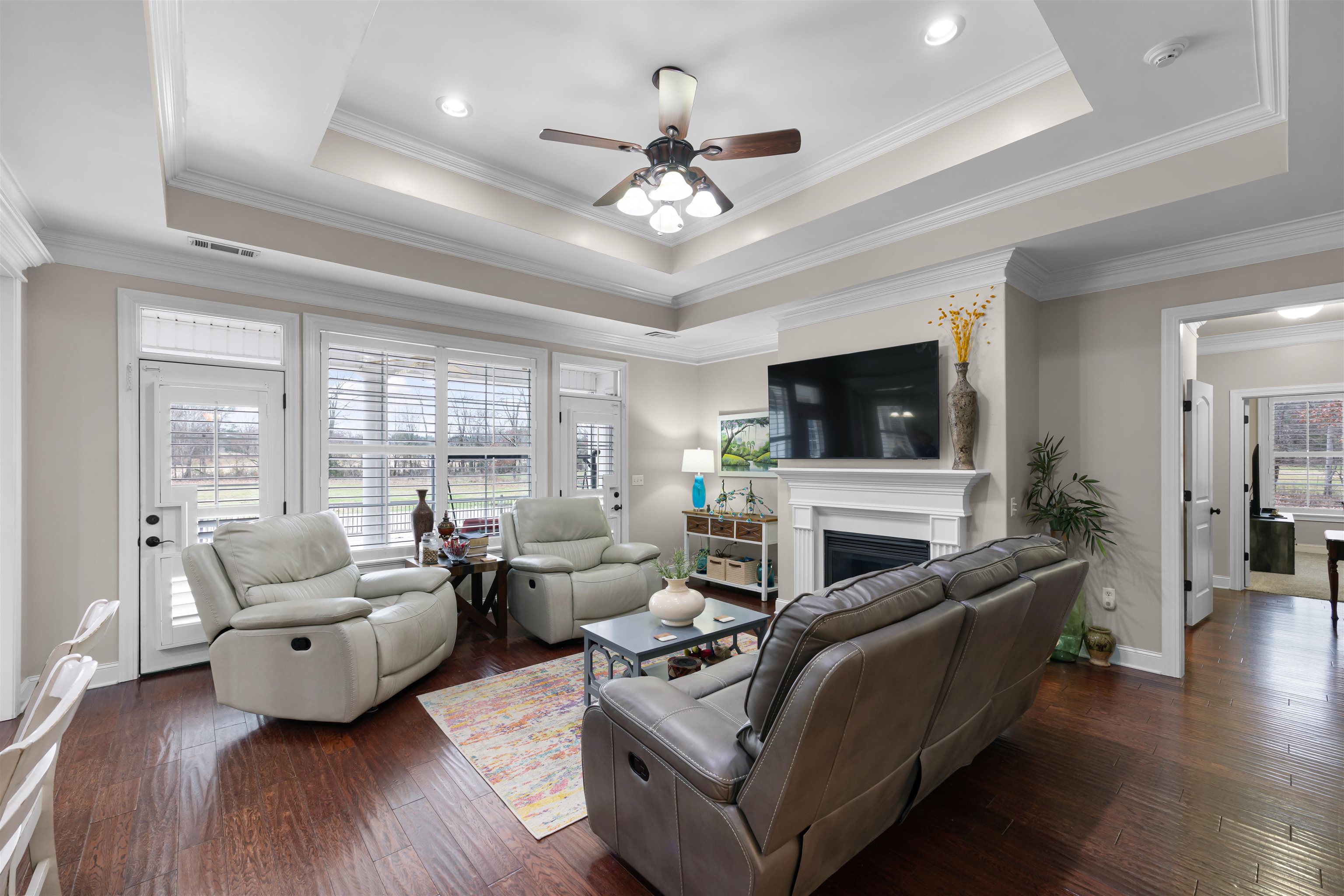 3285 Shadowood Lane Corinth, MS 38834 - Photo 12 of 31 a living room with furniture fireplace and a flat screen tv