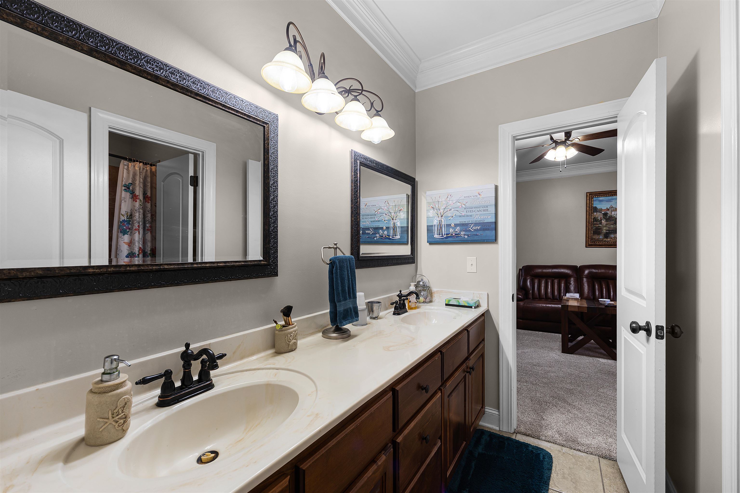 3285 Shadowood Lane Corinth, MS 38834 - Photo 22 of 31 a bathroom with a double vanity sink and a mirror