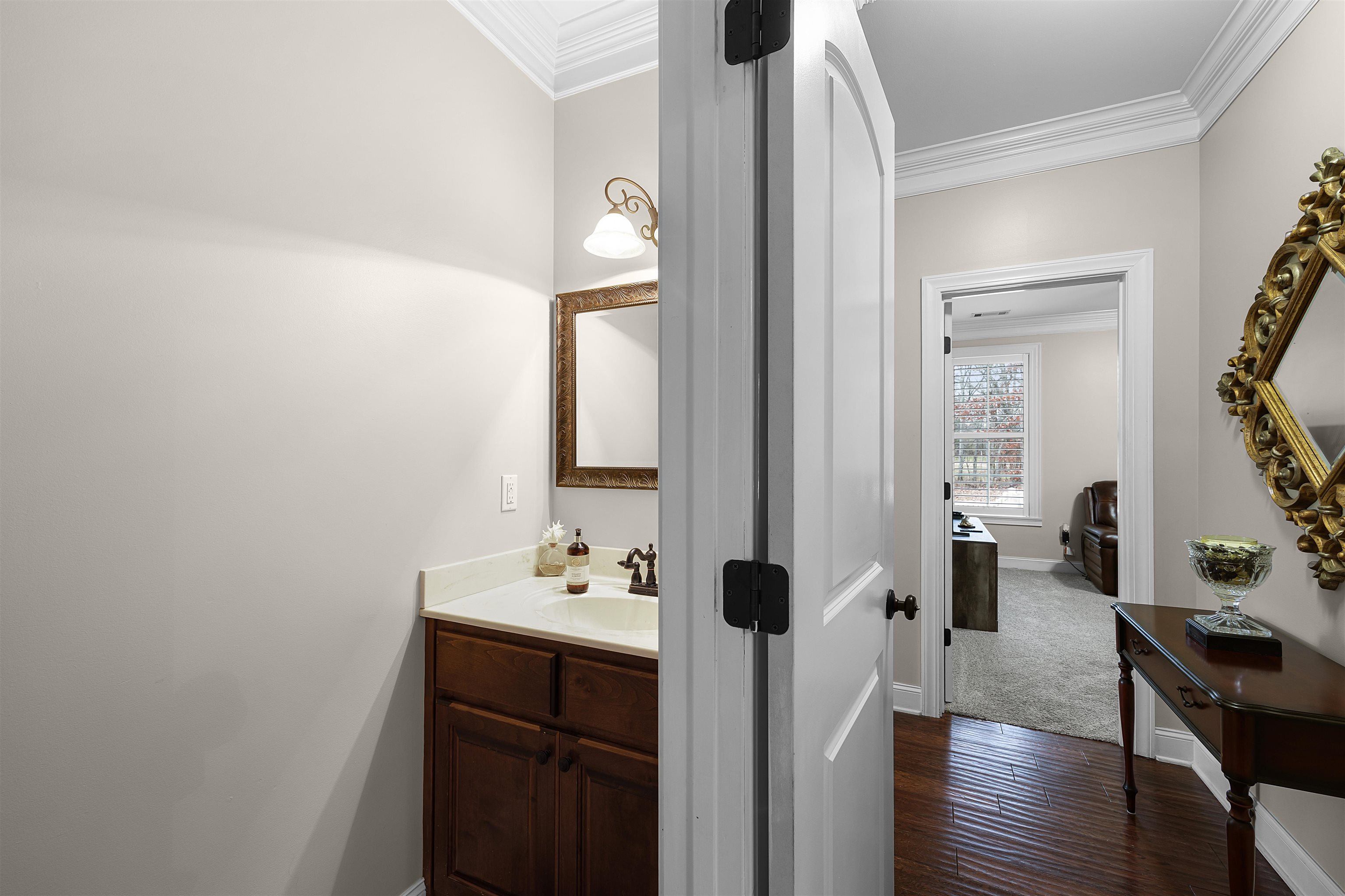 3285 Shadowood Lane Corinth, MS 38834 - Photo 25 of 31 a view of bathroom with sink and mirror