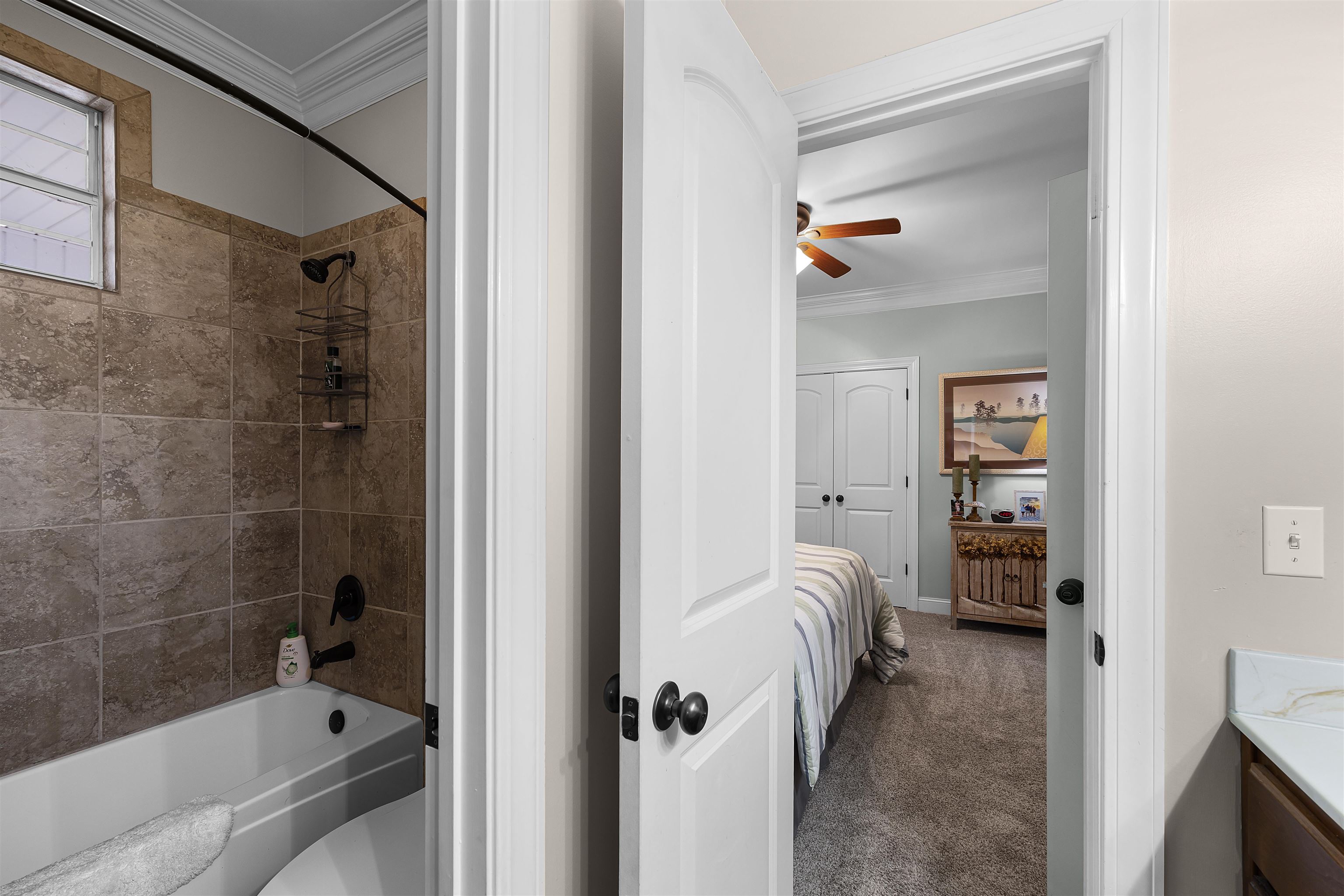 3285 Shadowood Lane Corinth, MS 38834 - Photo 27 of 31 a en suite bathroom with a bathtub and a shower