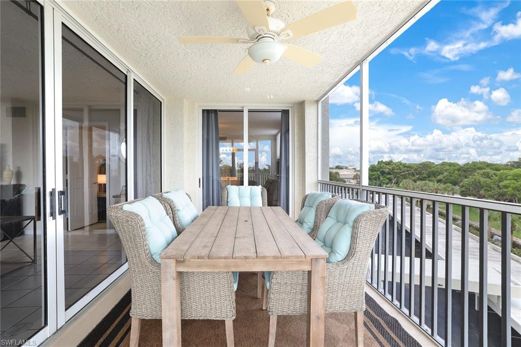 5550 Heron Point Drive, Unit 304 Naples, FL 34108 - Photo 14 of 19 a view of a dining room with furniture window and outside view