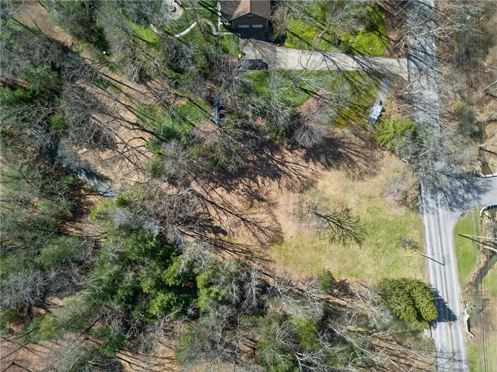 110 Bradford Park Road Baden, PA 15005 - Photo 13 of 14 a view of a yard with plants and tree