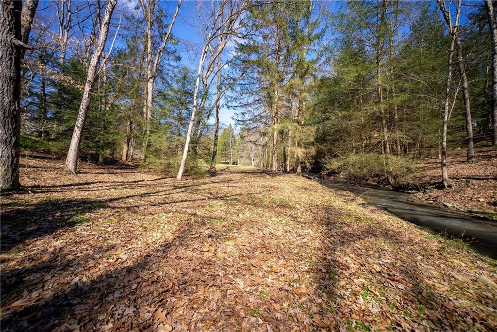 110 Bradford Park Road Baden, PA 15005 - Photo 9 of 14 a backyard of a house with lots of green space