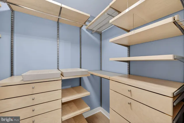 a view of cabinets and window