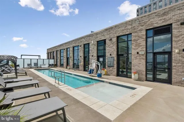 a view of a house with wooden floor and a large window