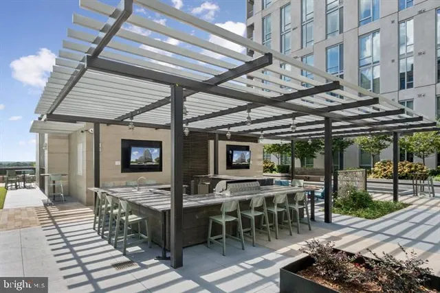 a view of a chairs and table in the patio