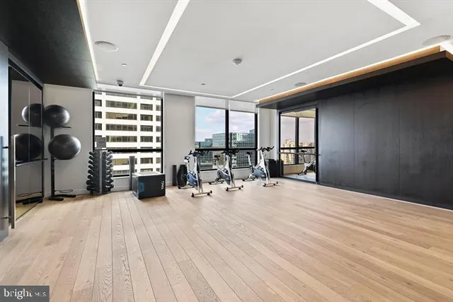 a view of a livingroom with furniture and a window