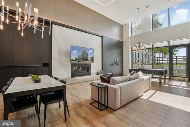 a living room with furniture and a table