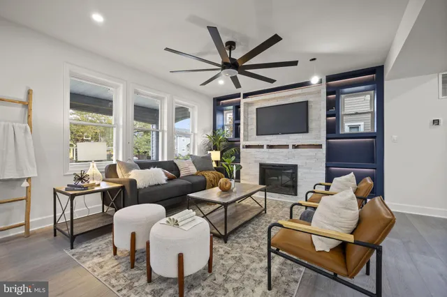 a bathroom with a sink a mirror and a shower