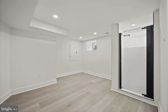 an aerial view of residential houses with outdoor space and swimming pool