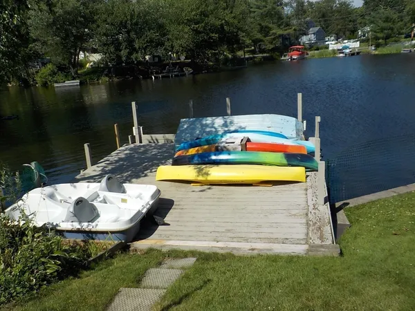 a view of a swimming pool with a lake view