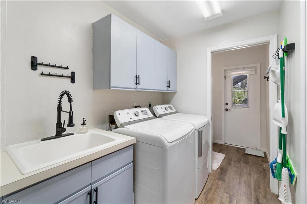 1041 29th Street Southwest Naples, FL 34117 - Photo 18 of 50 a utility room with dryer and washer