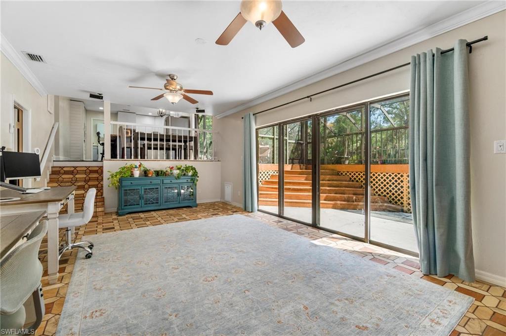 1041 29th Street Southwest Naples, FL 34117 - Photo 21 of 50 a view of livingroom with furniture and entryway