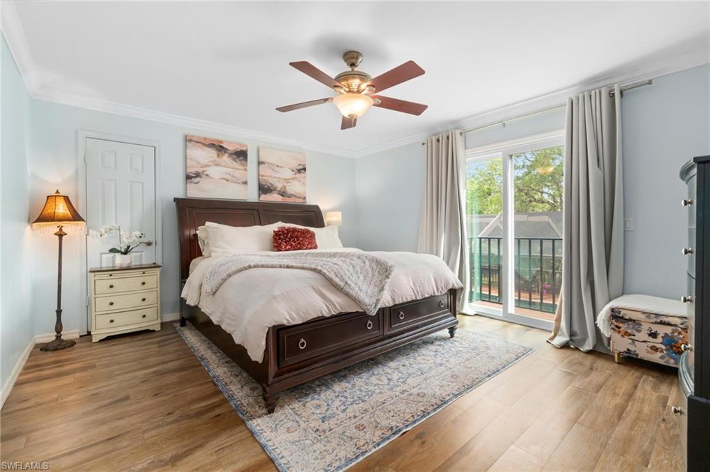1041 29th Street Southwest Naples, FL 34117 - Photo 23 of 50 a bedroom with a bed and window