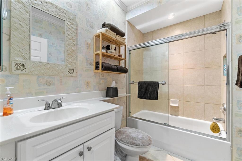 1041 29th Street Southwest Naples, FL 34117 - Photo 44 of 50 a bathroom with a sink a toilet and shower