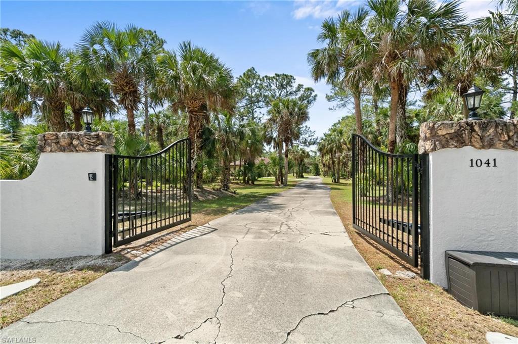 1041 29th Street Southwest Naples, FL 34117 - Photo 5 of 50 a view of a park with large trees