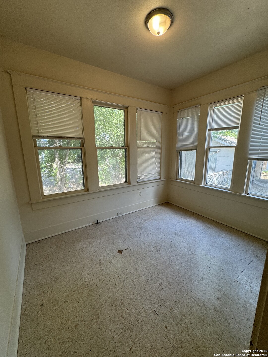 262 Orchard Road San Antonio, TX 78220 - Photo 12 of 16 an empty room with windows