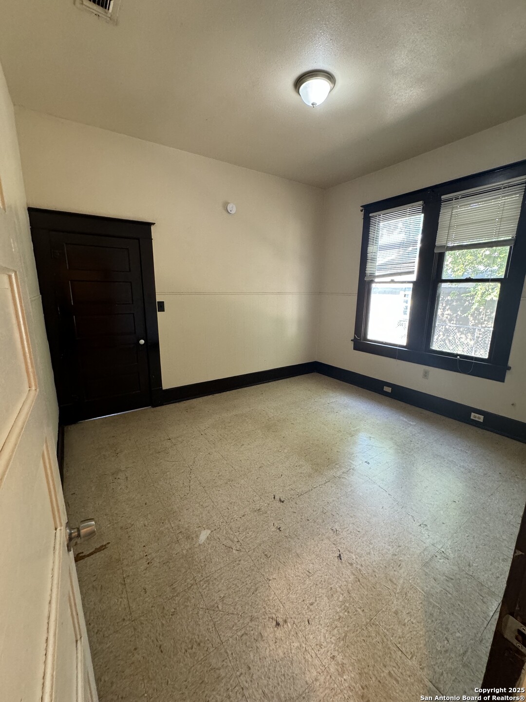 262 Orchard Road San Antonio, TX 78220 - Photo 13 of 16 an empty room with windows