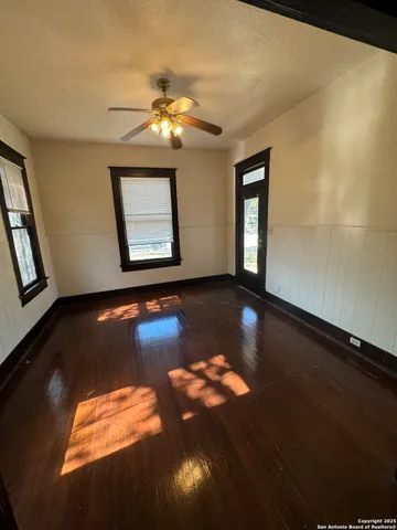 a view of an empty room and window