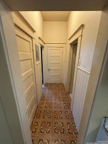 a bathroom with a tub toilet and a sink