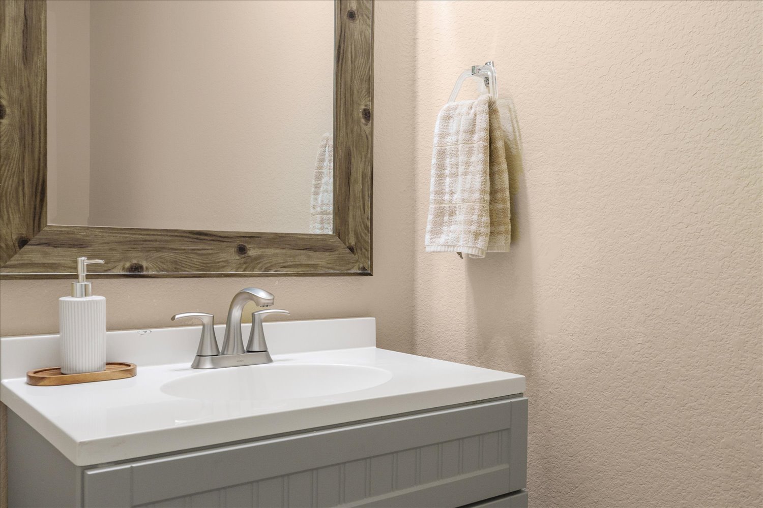 717 Kaluga Trail Leander, TX 78641 - Photo 18 of 40 a bathroom with a sink and a mirror