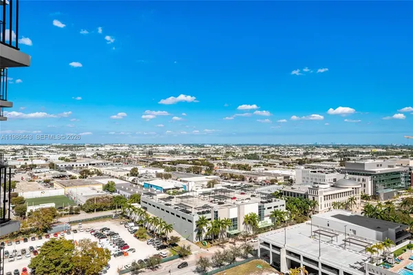 a kitchen with stainless steel appliances a refrigerator and a sink