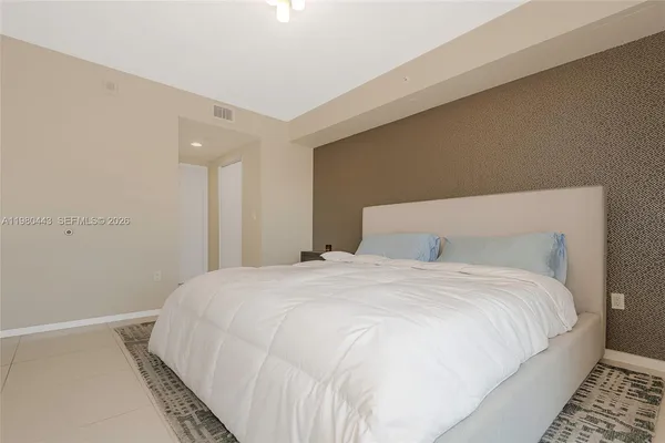 a view of a hallway with washer and dryer