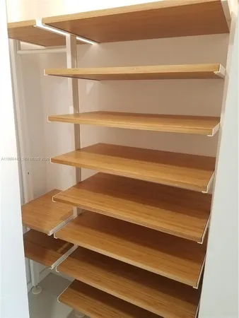 a view of swimming pool from a balcony