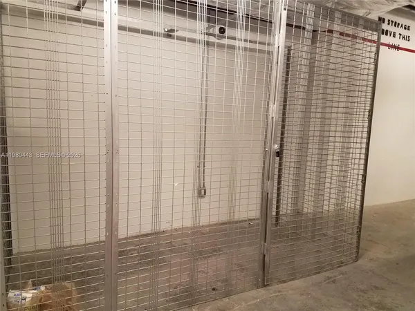 a living room with furniture and white walls