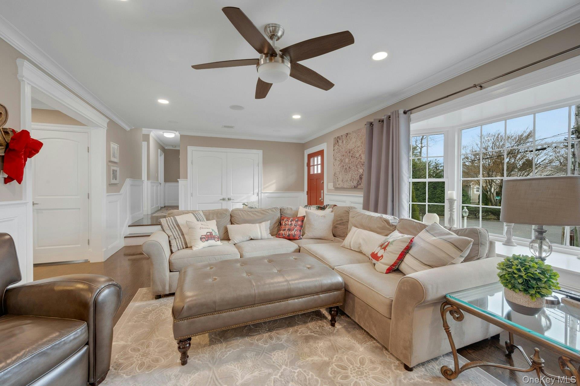 155 Hilburn Road Scarsdale, NY 10583 - Photo 11 of 35 a living room with furniture and a large window