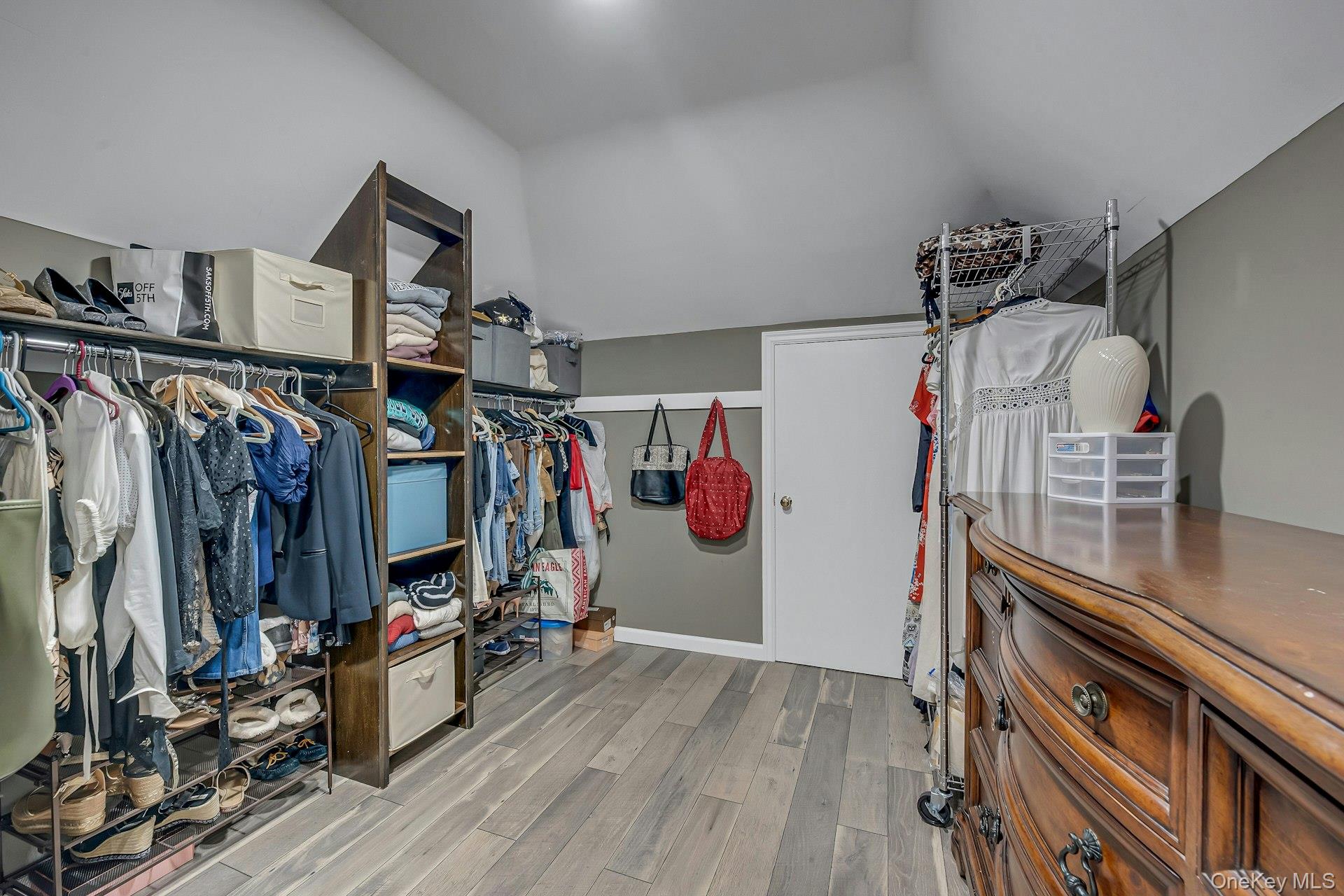 155 Hilburn Road Scarsdale, NY 10583 - Photo 21 of 35 a view of walk in closet with clothes and shoes