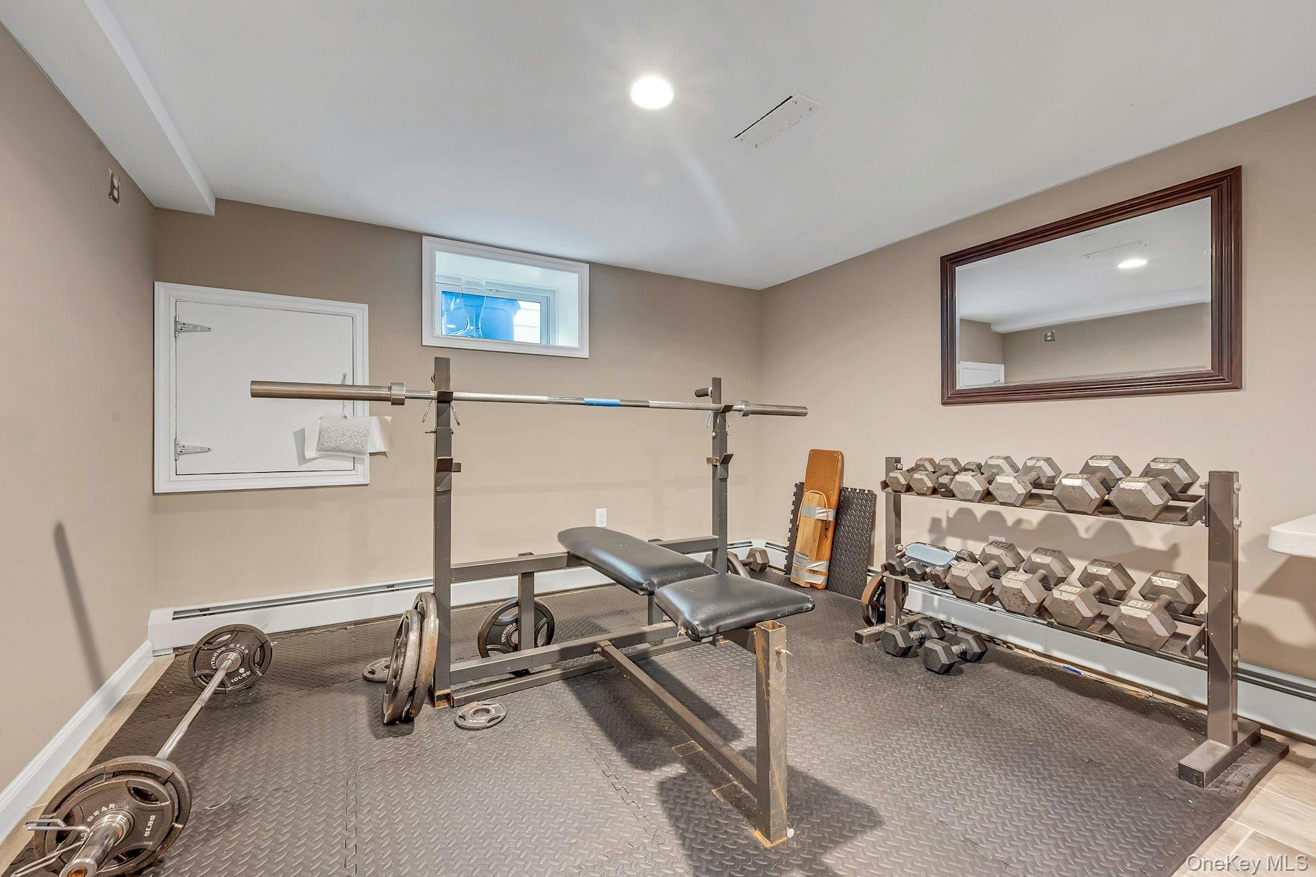 155 Hilburn Road Scarsdale, NY 10583 - Photo 24 of 35 a view of a room with gym equipment
