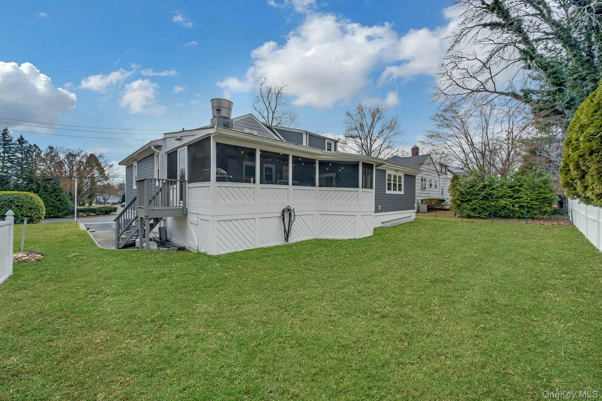 155 Hilburn Road Scarsdale, NY 10583 - Photo 27 of 35 a view of a house with a backyard