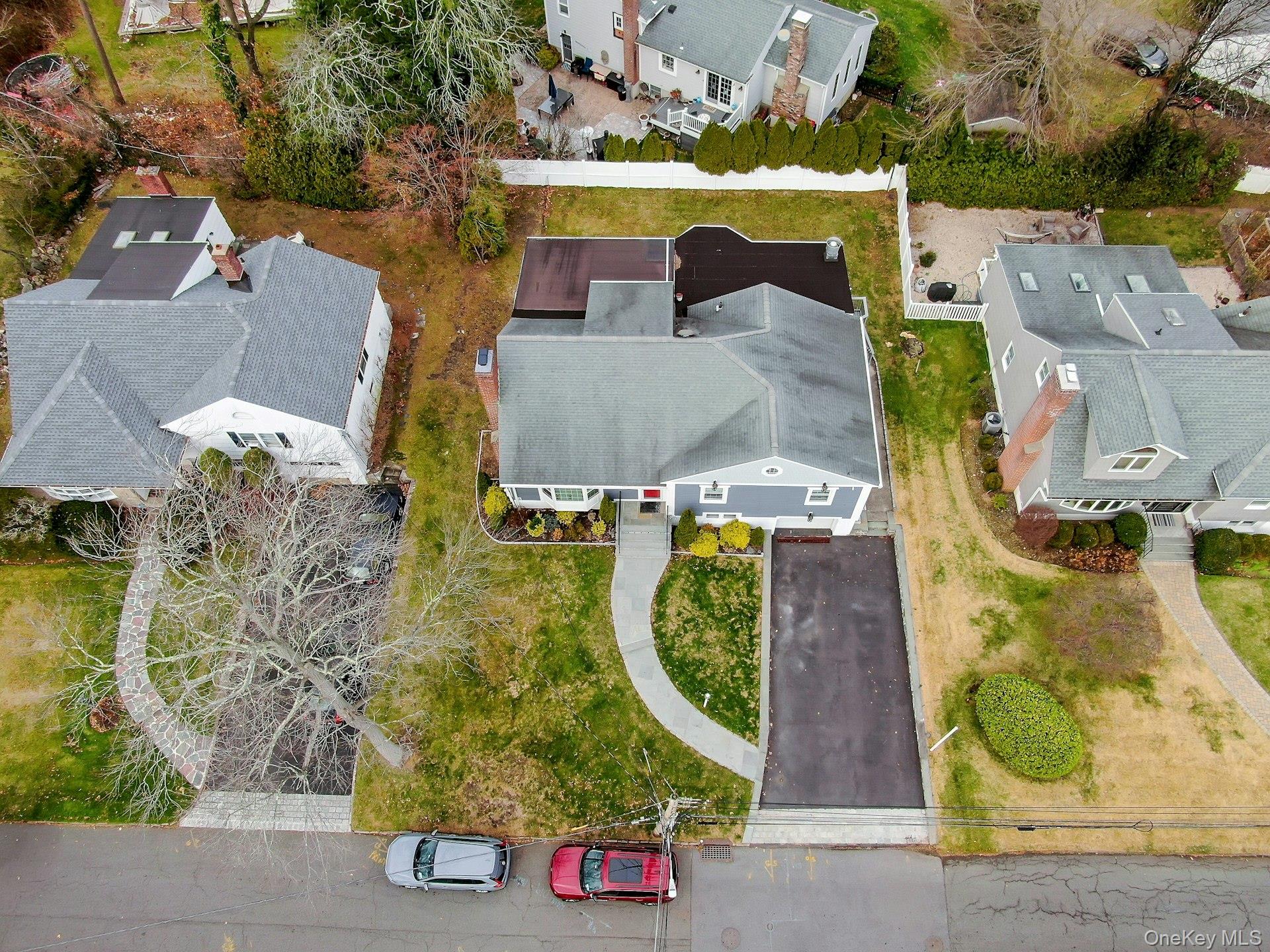 155 Hilburn Road Scarsdale, NY 10583 - Photo 29 of 35 an aerial view of residential house with outdoor space and swimming pool