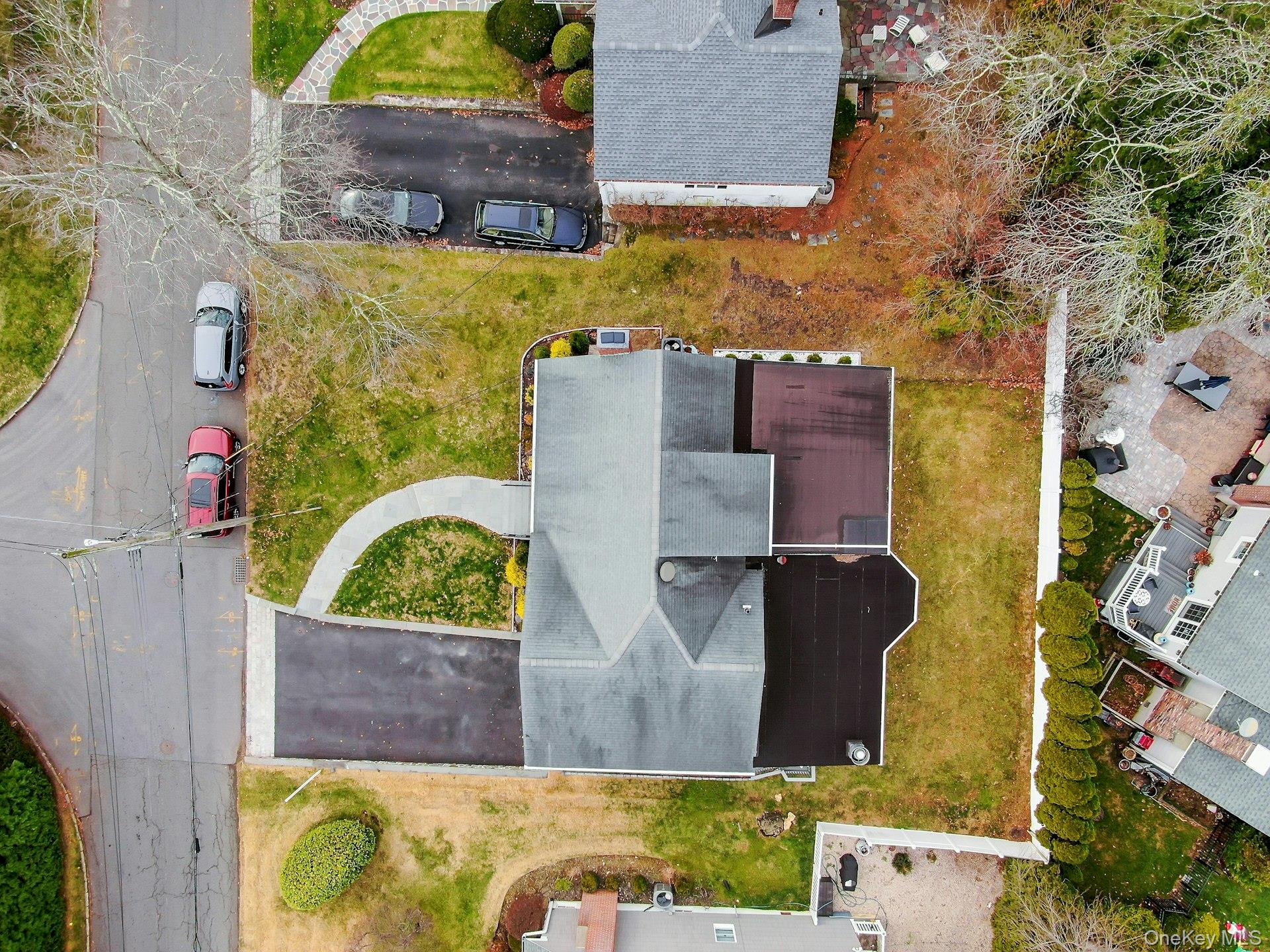 155 Hilburn Road Scarsdale, NY 10583 - Photo 30 of 35 an aerial view of a house with swimming pool
