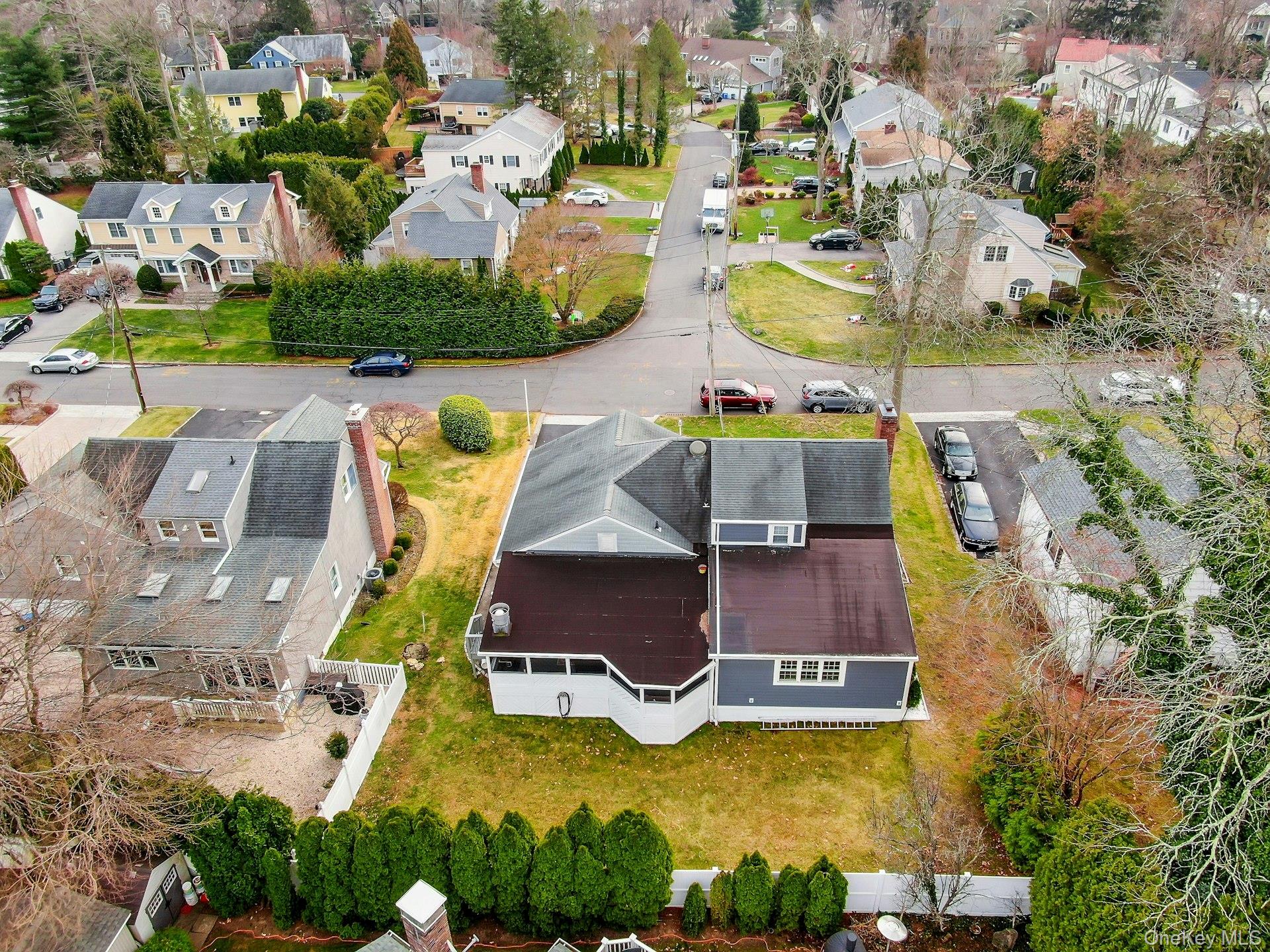 155 Hilburn Road Scarsdale, NY 10583 - Photo 32 of 35 an aerial view of residential houses with outdoor space and swimming pool