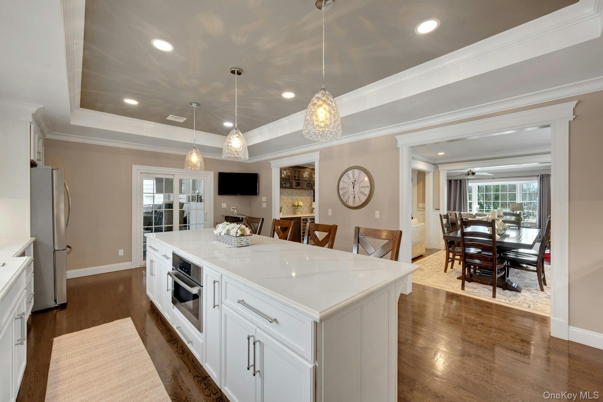 155 Hilburn Road Scarsdale, NY 10583 - Photo 6 of 35 a large white kitchen with a large island