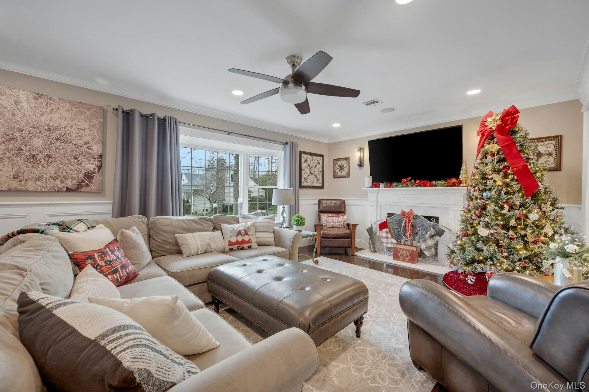 155 Hilburn Road Scarsdale, NY 10583 - Photo 9 of 35 a living room with furniture and a flat screen tv