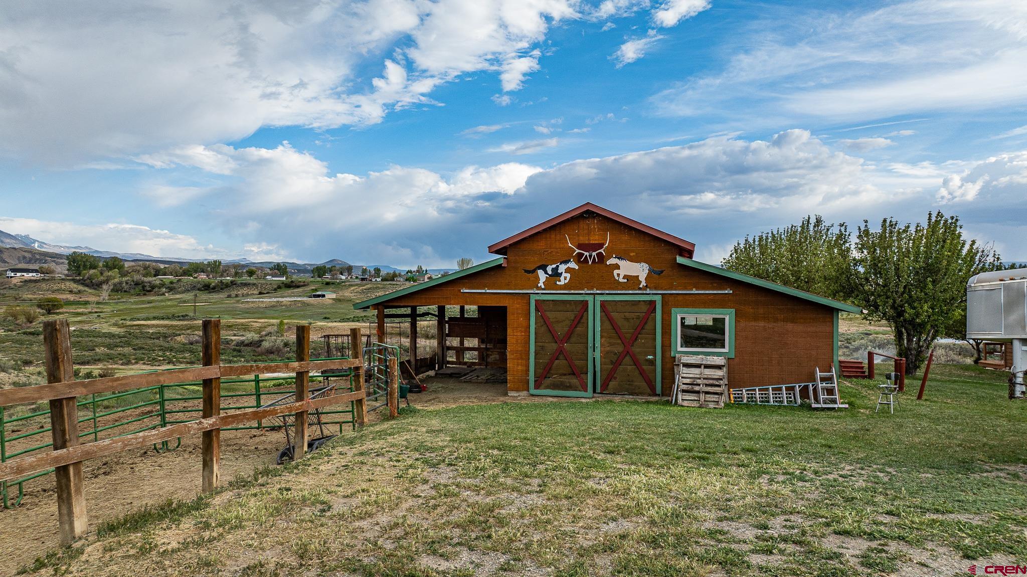 37760 Back River Road Paonia, CO 81428 - Photo 11 of 38 a view of a house with a outdoor space