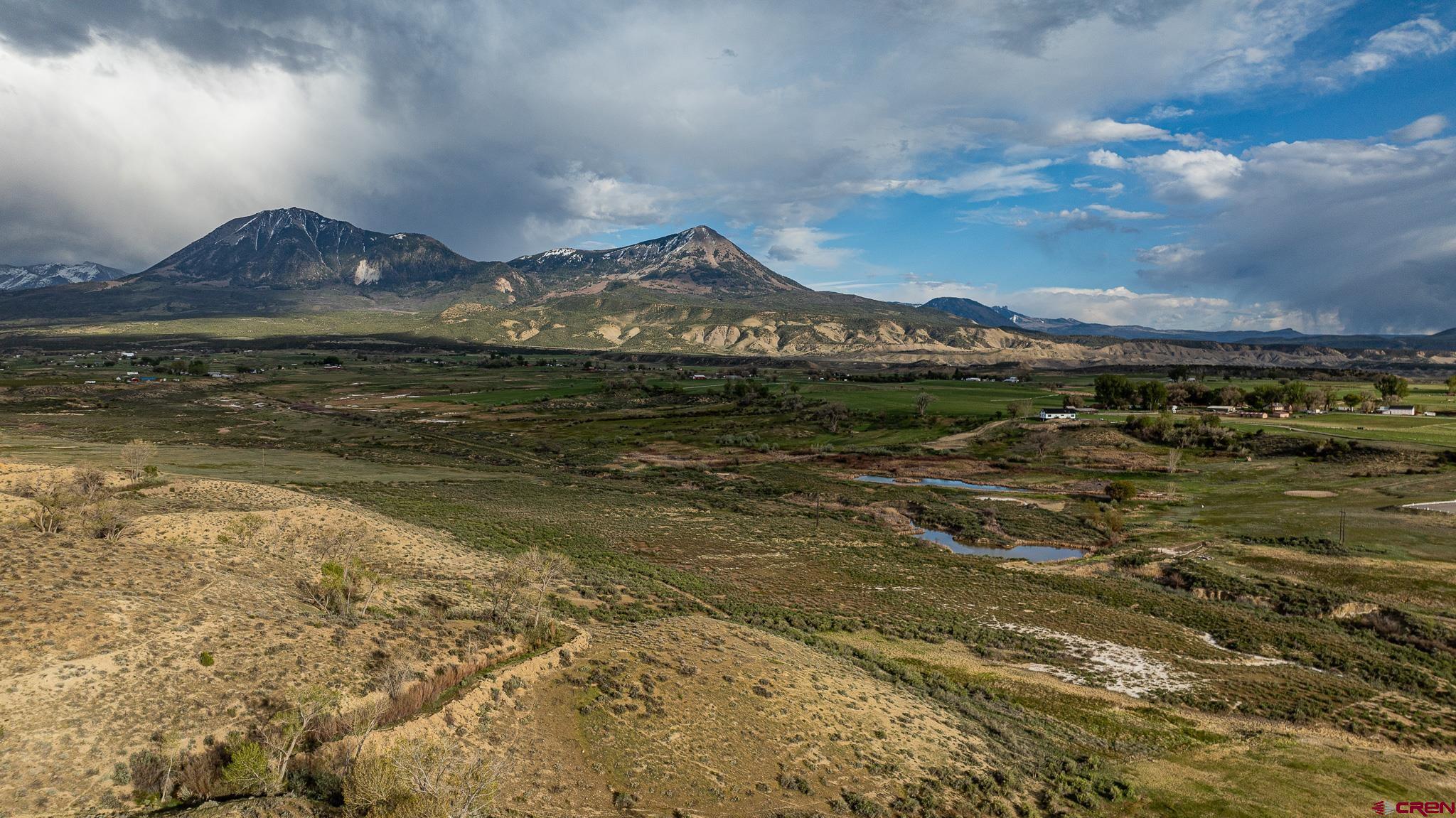 37760 Back River Road Paonia, CO 81428 - Photo 16 of 38 a view of a lake with a mountain in the background