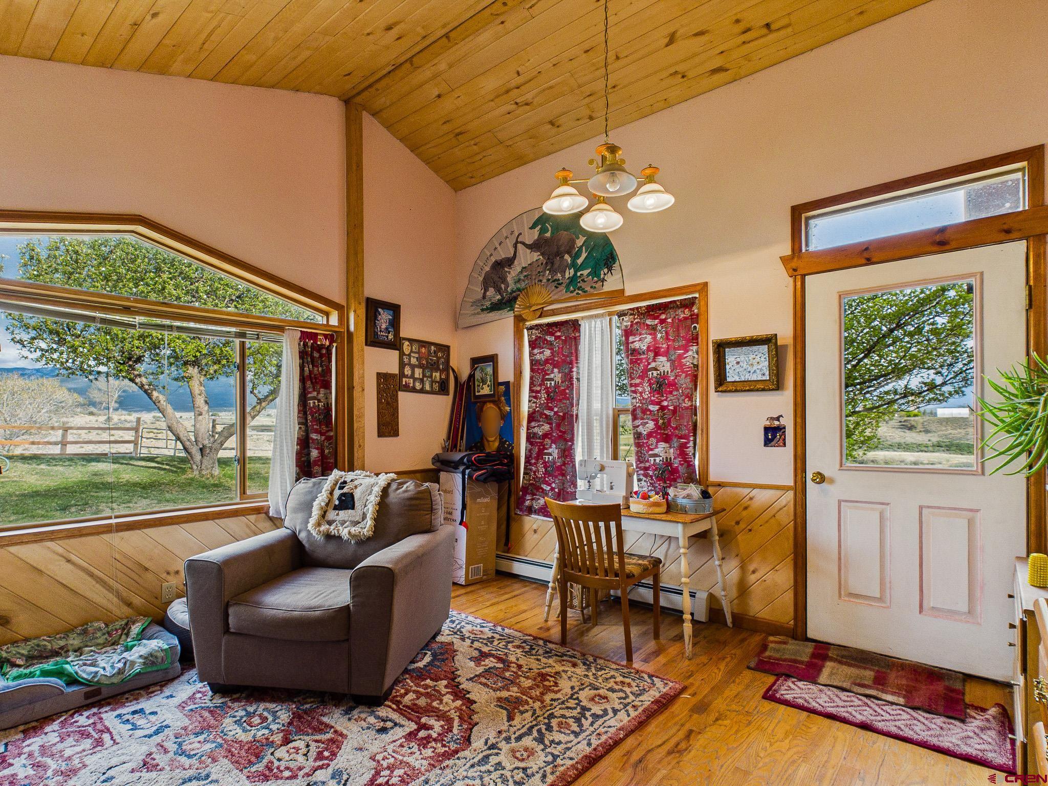 37760 Back River Road Paonia, CO 81428 - Photo 28 of 38 a living room with furniture and a large window